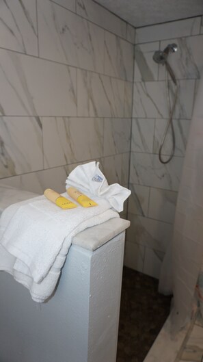 Combined shower/bathtub, hair dryer, towels - Bright & clean beachside condo with heated pool ~ FN 604 (Saint Pete Beach)