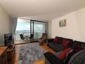 Living area - Panoramic views over the beach from a stylish apartment in a landmark building. (Westward Ho!)
