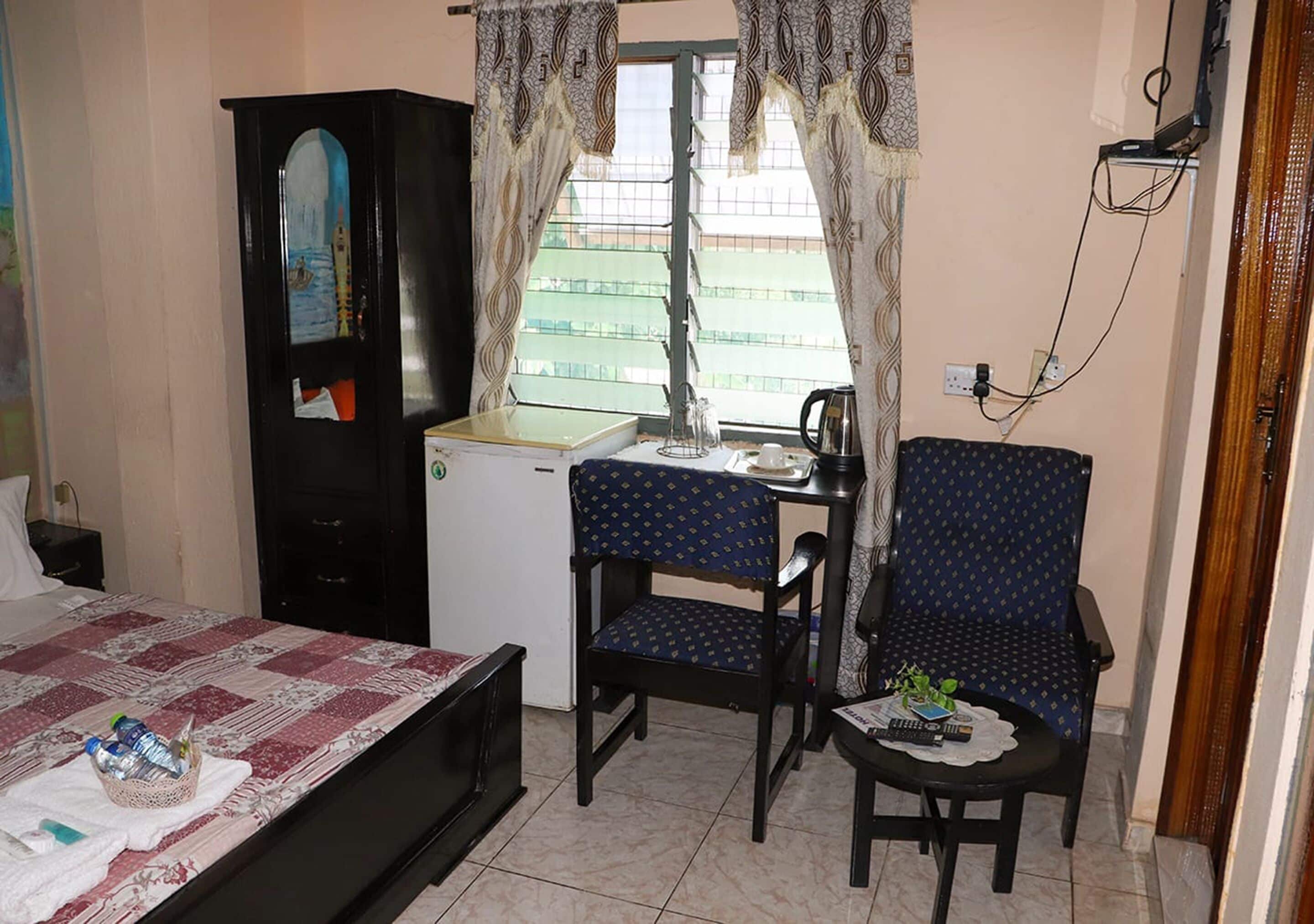 superior room, refrigerator | desk, bed sheets