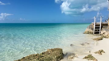 On the beach, sun loungers, beach towels