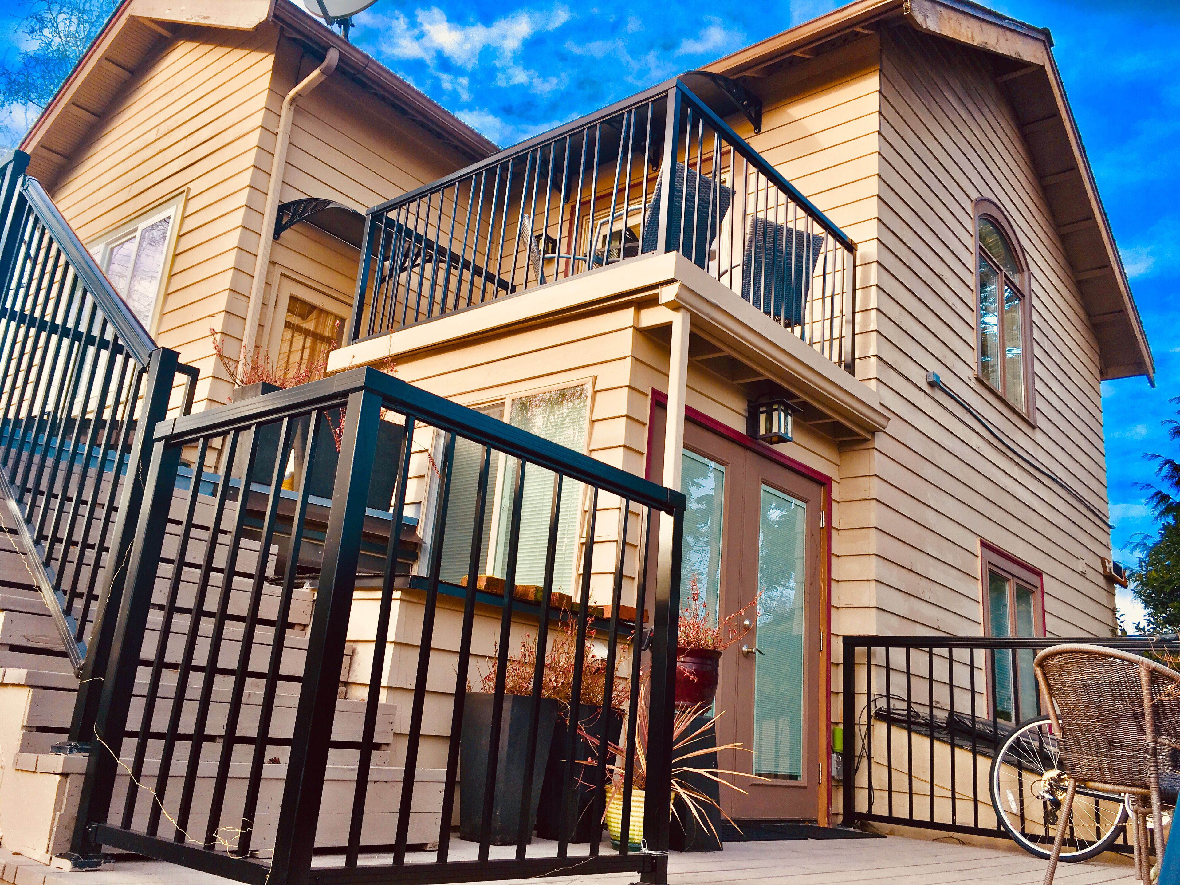 The Ravenna Garden Apartment's entry and deck. Quiet, private, garden and rest