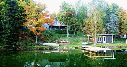 Beautiful newer home on the sunny side of peaceful Camp Lake in Iron River