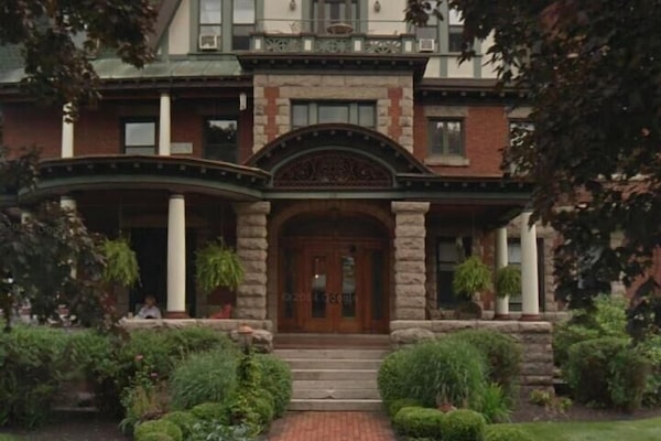 Welcome to a Victorian Mansion with updates galore yet old world charm remains.