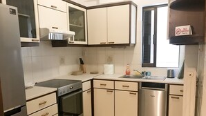Apartment | Private kitchen | Coffee/tea maker, full-size fridge, oven, stovetop - Marina Apartment (Spata-Artemida)
