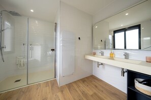 Eco-friendly toiletries, hair dryer, towels, soap