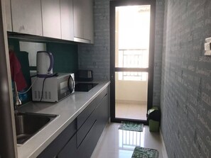 Fridge, microwave, cookware/dishes/utensils, spices - BEST PRICE New ICON56 ★ LUXURY Rooftop Pool & Gym (phường 12)