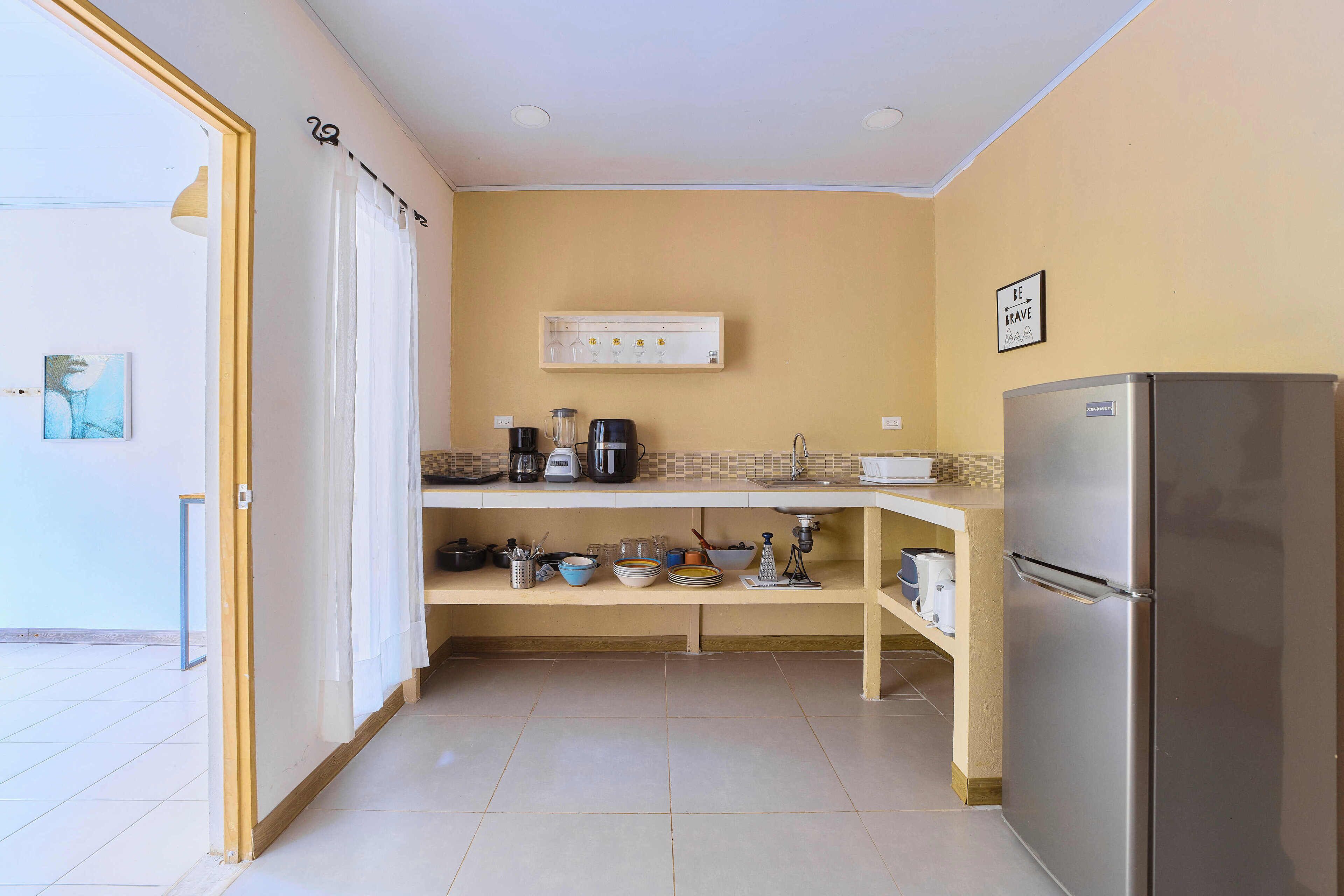 standard room, 1 queen bed, accessible, non smoking | private kitchen | fridge