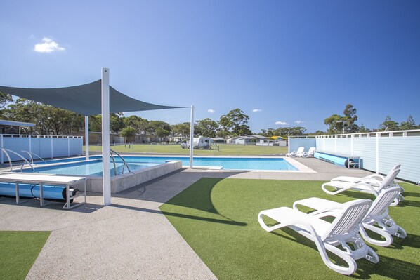 Outdoor pool, open 8:00 AM to 8:00 PM, pool loungers