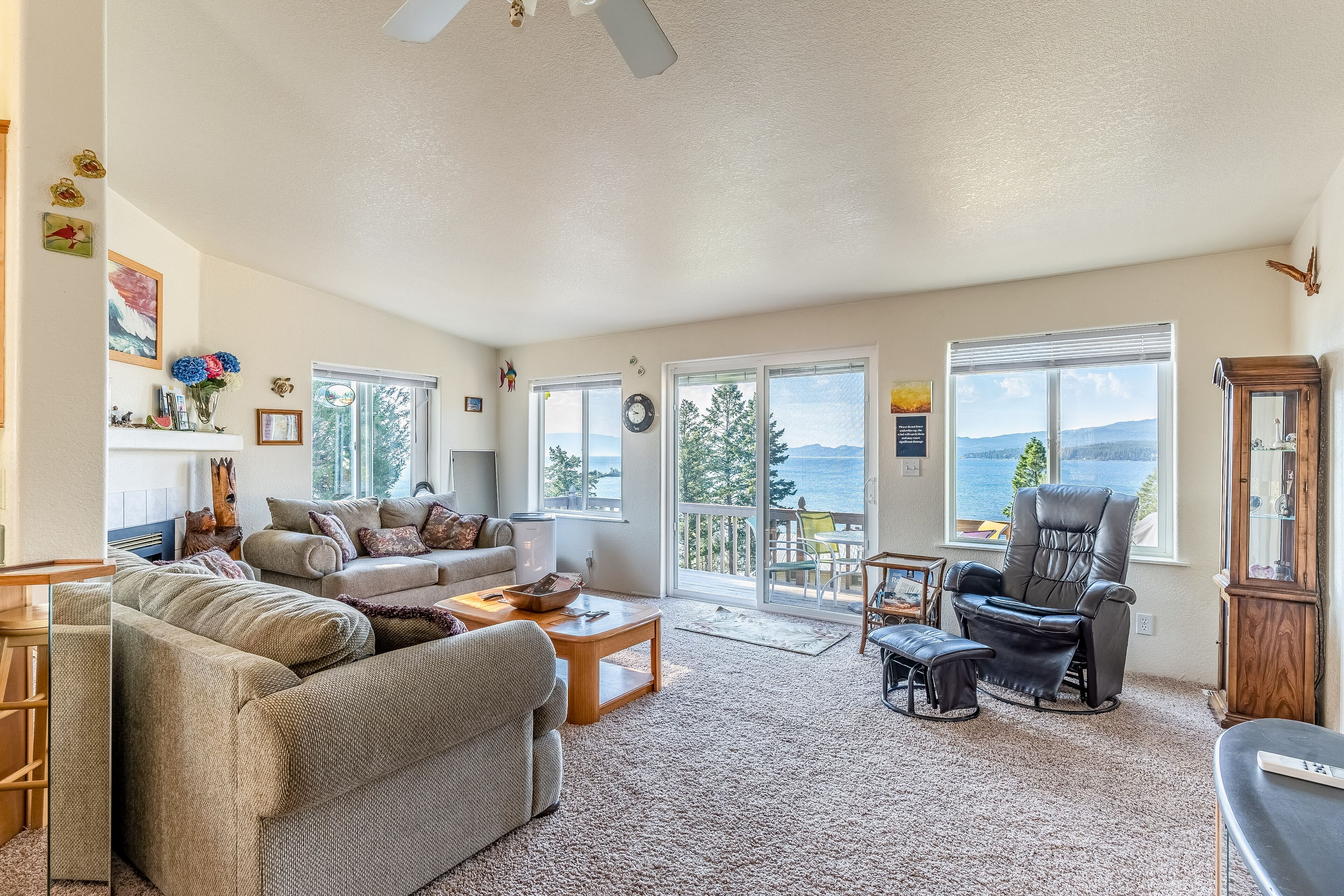 Mountain home with Flathead Lake views, balcony & grill