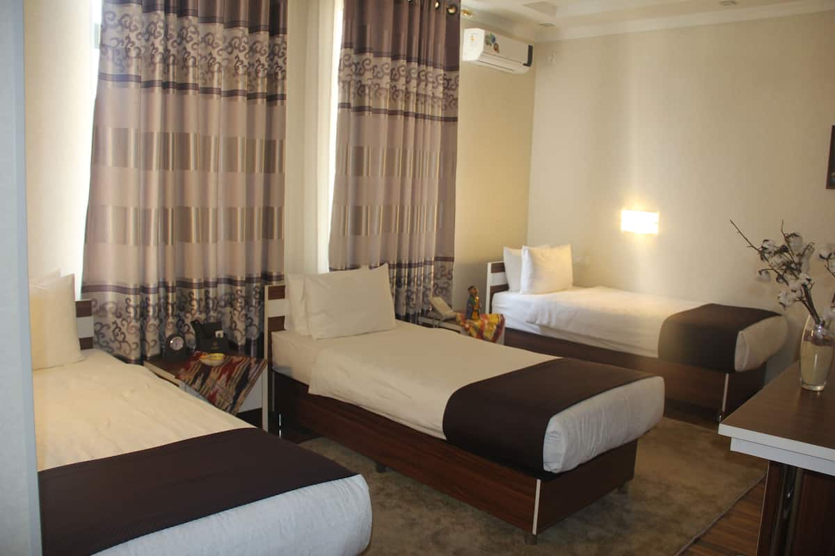 Standard Triple Room, Non Smoking | In-room safe, blackout drapes, soundproofing, iron/ironing board