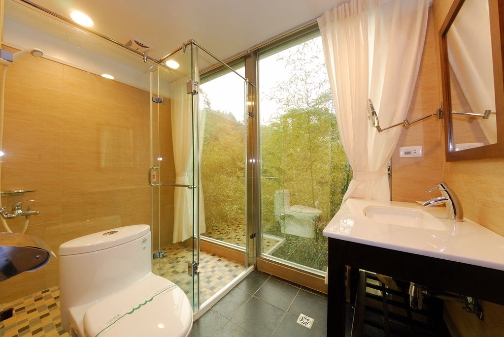 family room | bathroom | shower, free toiletries, hair dryer, slippers