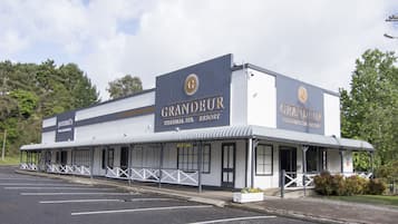 Welcome to The Grandeur Thermal Spa Resort, where a modern architectural design greets you at the clearly marked reception area.