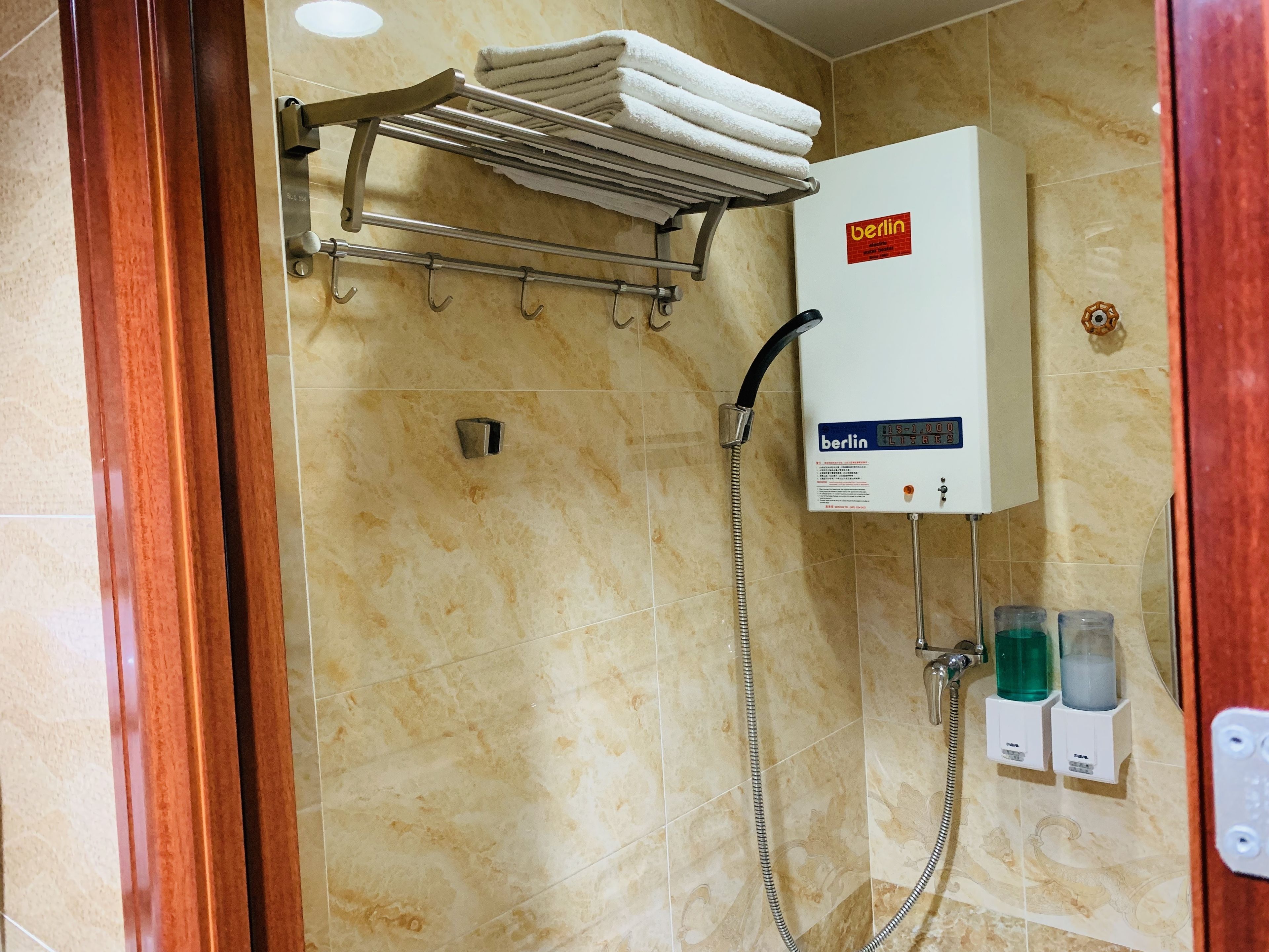 Triple Room, Non Smoking | Bathroom amenities | Shower, free toiletries, hair dryer, slippers