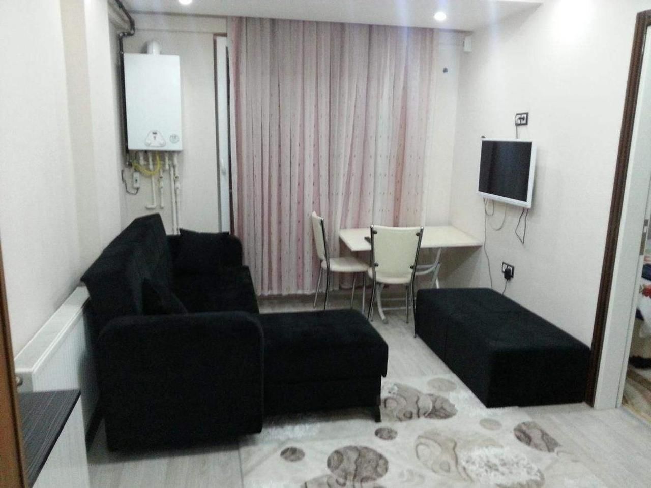 Apartamento | Zona de estar | Una televisión LCD