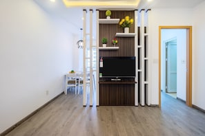 Deluxe Apartment, Non Smoking | Living area | 20-inch Smart TV with digital channels, TV, Netflix - iSeaview Nha Trang Beach Apartment (Nha Trang)