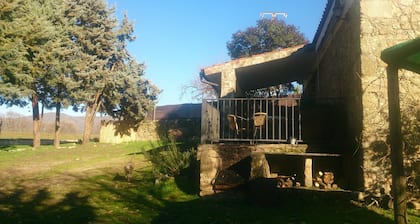 Full rental house located in the countryside, porch outside with barbecue