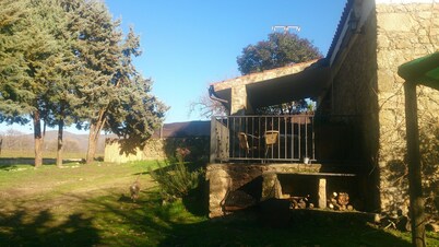 Full rental house located in the countryside, porch outside with barbecue