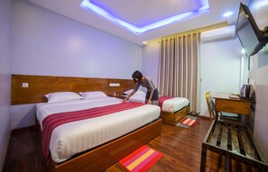 Phòng 3 dành cho gia đình | Minibar, két bảo mật tại phòng, bàn 