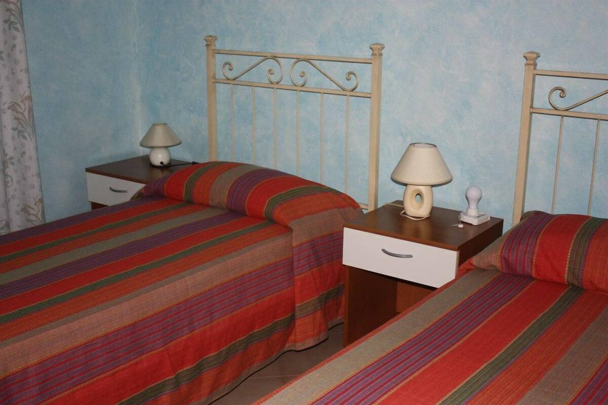 Desk, free cots/infant beds, free WiFi, bed sheets