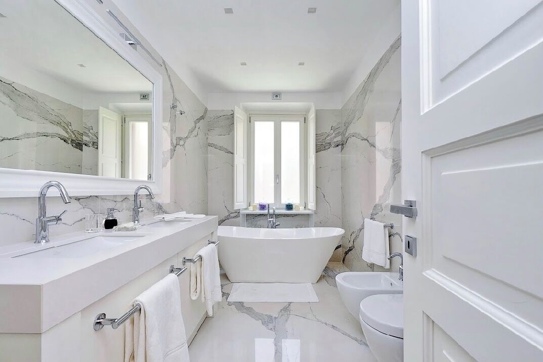 Combined shower/tub, hair dryer, slippers, bidet