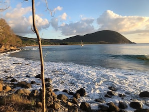 On the beach, sun-loungers