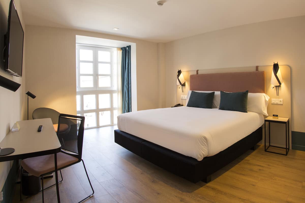 double room | minibar, in-room safe, desk, blackout curtains