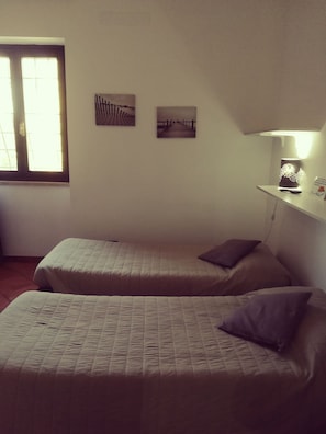 Chambre Double ou avec lits jumeaux | Lits pliants/supplémentaires, draps fournis