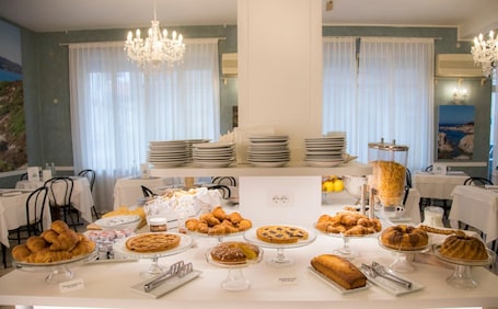 Daily buffet breakfast (EUR 15 per person)