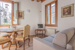 Apartamento, 1 quarto | Área de estar