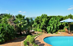 Outdoor pool, open 6:30 AM to 8:00 PM, pool umbrellas, pool loungers - Stirling Manor Boutique Guest House (Hartbeespoort)