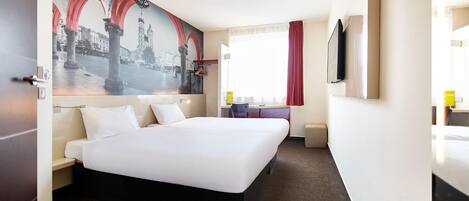 Desk, laptop workspace, free WiFi, bed sheets