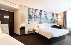 Desk, laptop workspace, free WiFi, bed sheets