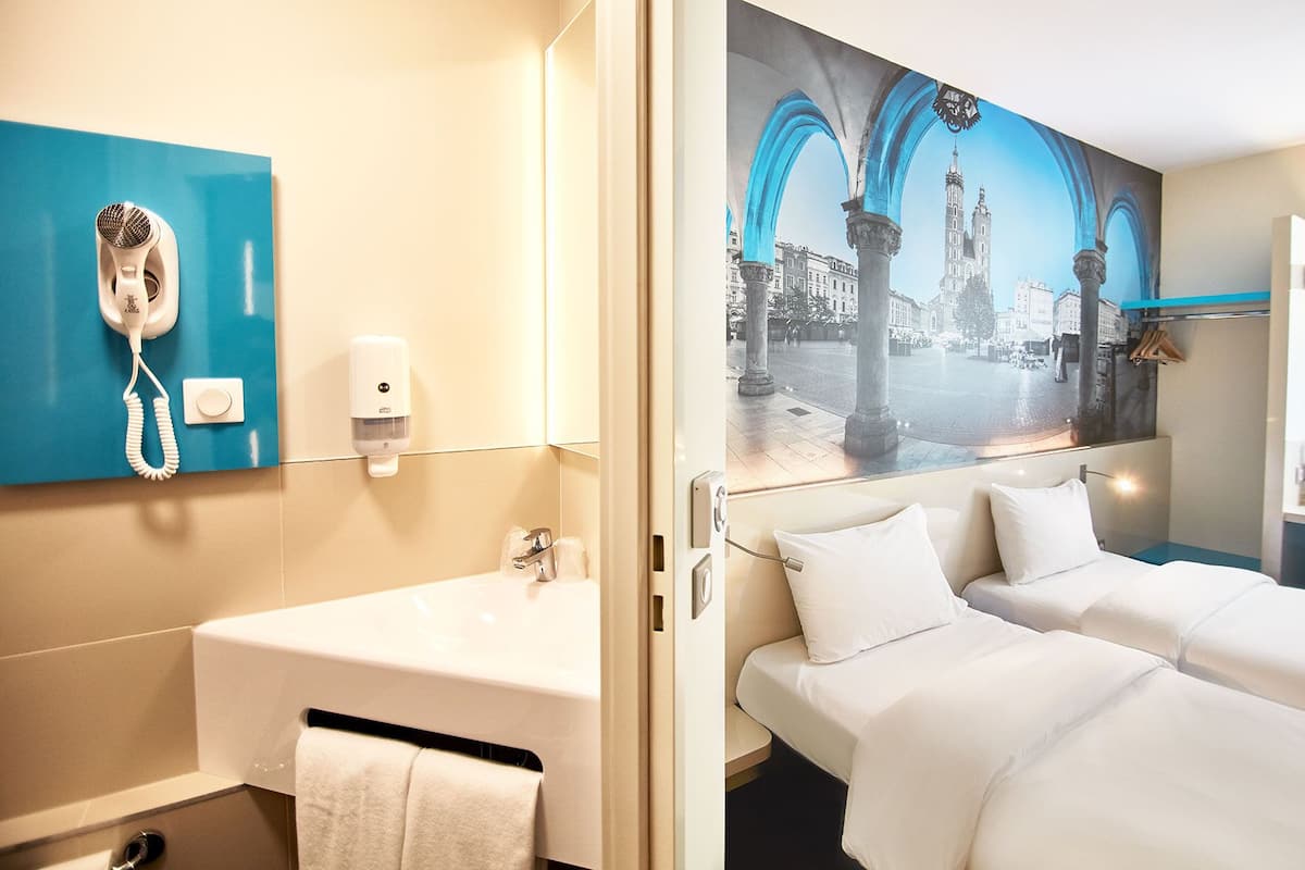 Standaard Twin kamer | Een bureau, een laptopwerkplek, gratis wifi, beddengoed