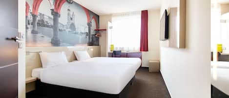 Desk, laptop workspace, free WiFi, bed sheets