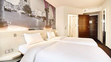 Desk, laptop workspace, free WiFi, bed sheets