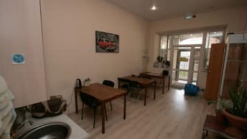 Full-sized fridge, microwave, stovetop, cookware/dishes/utensils