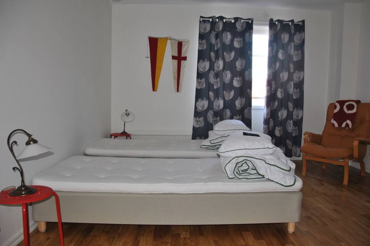 Apartment, Multiple Beds, Non Smoking, Partial Sea View | Blackout drapes, soundproofing, iron/ironing board