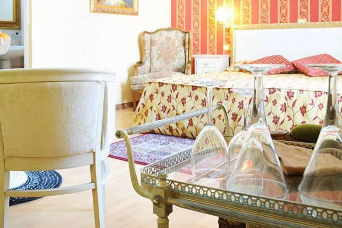 Habitación cuádruple Deluxe | Caja fuerte, cunas gratuitas, wifi gratis y ropa de cama