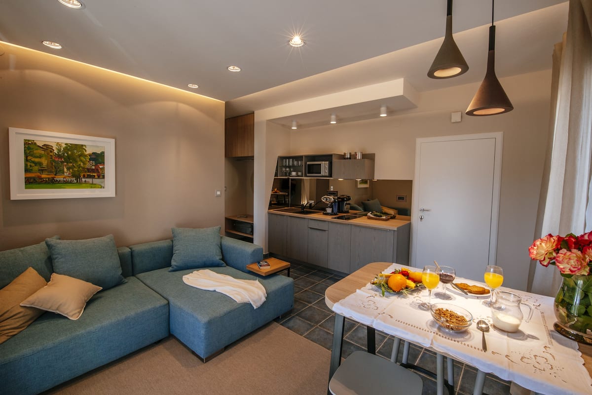 Deluxe Apartment, 1 Bedroom, Balcony (2) | Living area | LED TV