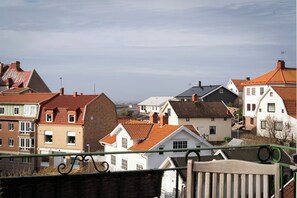 A residential area with various houses, some with red roofs and others with different colors. - L Boutique Hotel (Lysekil)
