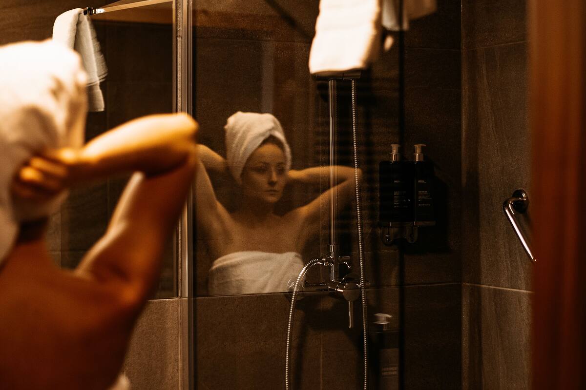 shower, hair dryer, bathrobes, slippers