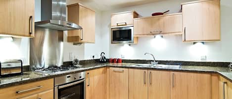 Dishwasher, highchair, cookware/dishes/utensils