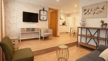 Deluxe Apartment, Patio, Garden View (Ground Floor) | Living area