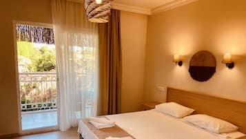 Chambre Standard, 1 trÚs grand lit, non-fumeurs, vue jardin | 1 chambre, literie de qualité supérieure, minibar