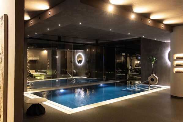 Indoor pool, outdoor pool, open 9:00 AM to 8:00 PM, pool umbrellas