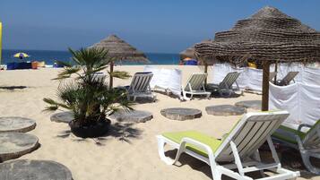 Beach nearby, sun loungers