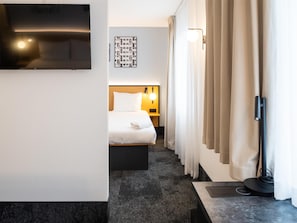 Desk, blackout curtains, free WiFi, bed sheets