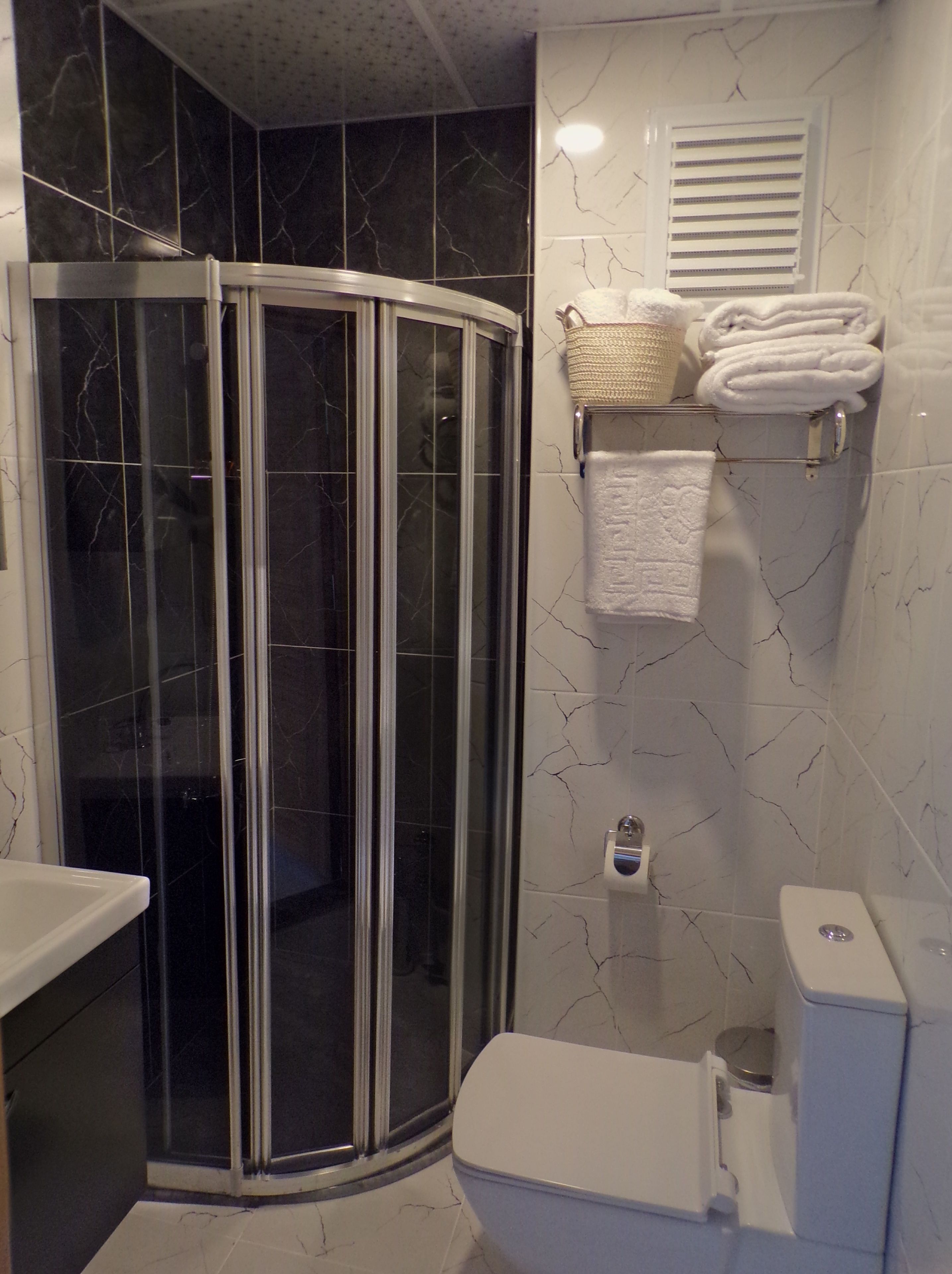 shower, free toiletries, hair dryer, slippers