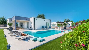 Outdoor pool, pool umbrellas, pool loungers