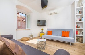 Familienapartment | Wohnbereich | Flachbildfernseher